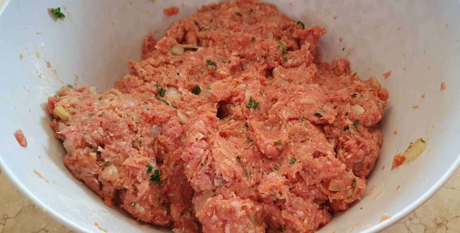 Steaks hachés maison, sauce aux poivrons et à la crème